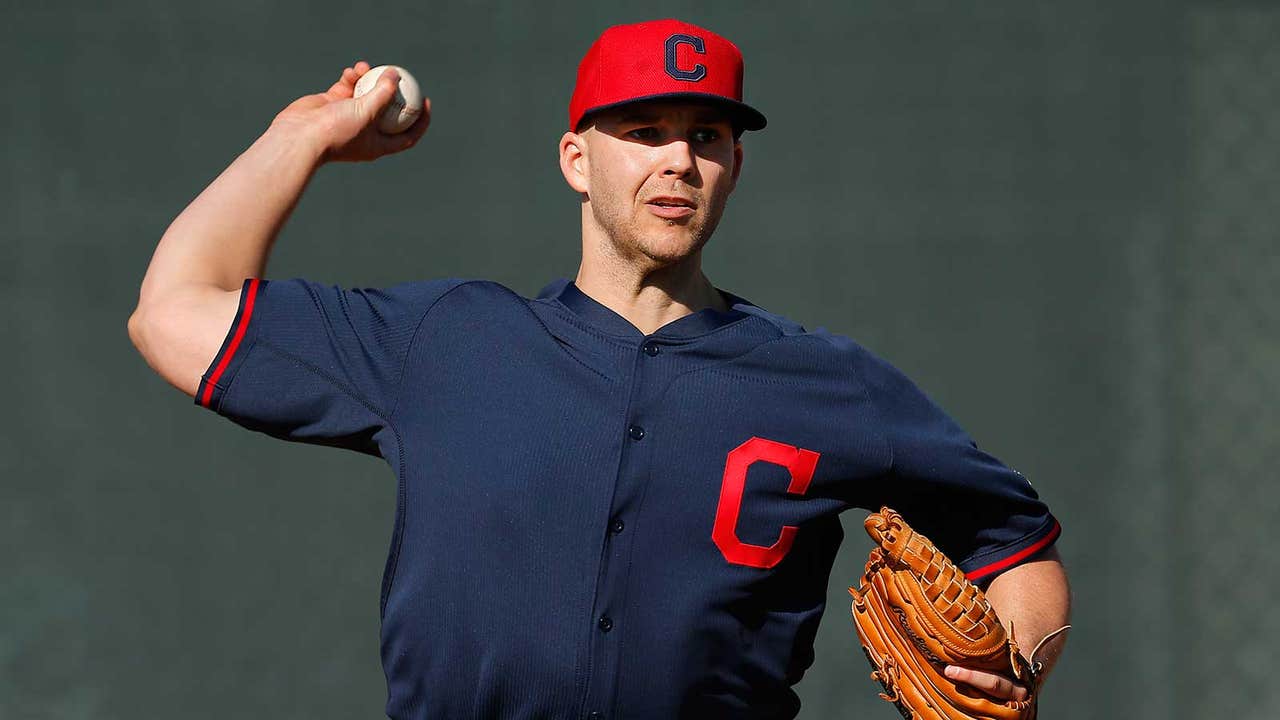 Santana makes debut at 3B, Indians beat Reds 12-3